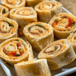 Easy Fiesta Roll Ups (Mexican Pinwheels Recipe)