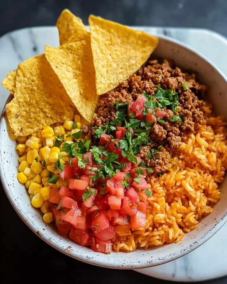 Doritos Taco Bowl with Ground Beef, Rice, and Fresh Toppings Recipe