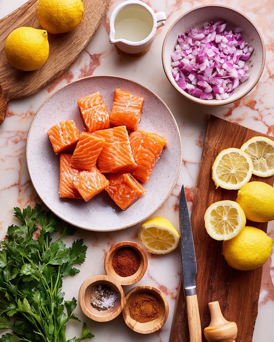 The image shows a white plate filled with bright orange salmon pieces with visible light lines on the fish. Above the plate, there is a small white cup with liquid, and a round wooden bowl with four different spices in red, brown, and beige colors arranged in small piles. To the right, a white bowl holds chopped purple onion pieces with sharp edges. Below the bowls, a wooden board shows several round lemon slices and a knife with a wooden handle. To the bottom right, there is a wooden bowl with two whole yellow lemons and a lemon juicer. Fresh green parsley leaves lay spread out at the bottom left corner on a white marbled surface. Small wooden bowls filled with salt and ground black pepper are also visible nearby. Photo taken with an iphone --ar 4:5 --v 7