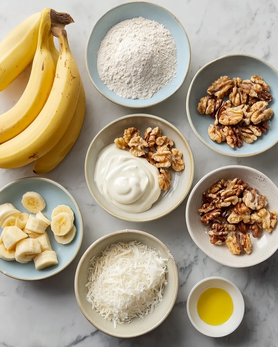 The image shows several small white bowls placed on a white marbled surface, each containing different ingredients. There are three whole bananas placed near the top center and left side of the frame, with one banana sliced into pieces in a small white bowl. The bowls hold white flour, walnuts in different sizes, white chocolate chips, shredded coconut, plain yogurt, and a small amount of yellow oil. The bowls have a light blue or beige rim, and the ingredients are neatly arranged in a flat lay style. photo taken with an iphone --ar 4:5 --v 7