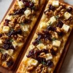 Toasted Flatbread with Brie, Cranberries, Walnuts, and Hot Honey Drizzle Recipe